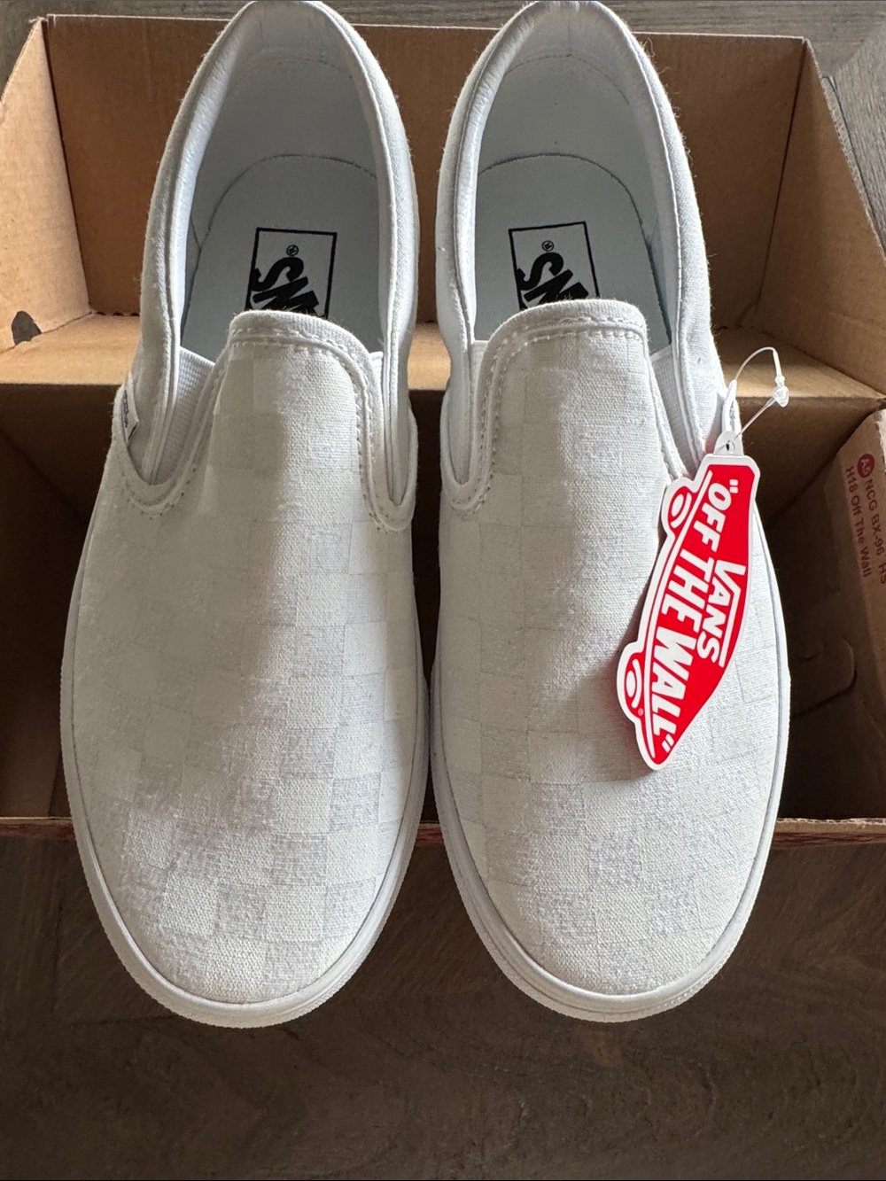 Vans White Checkerboard Slip-On Sneakers